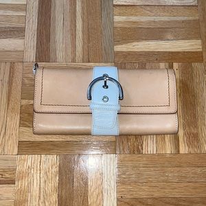Coach brown leather wallet with front buckle